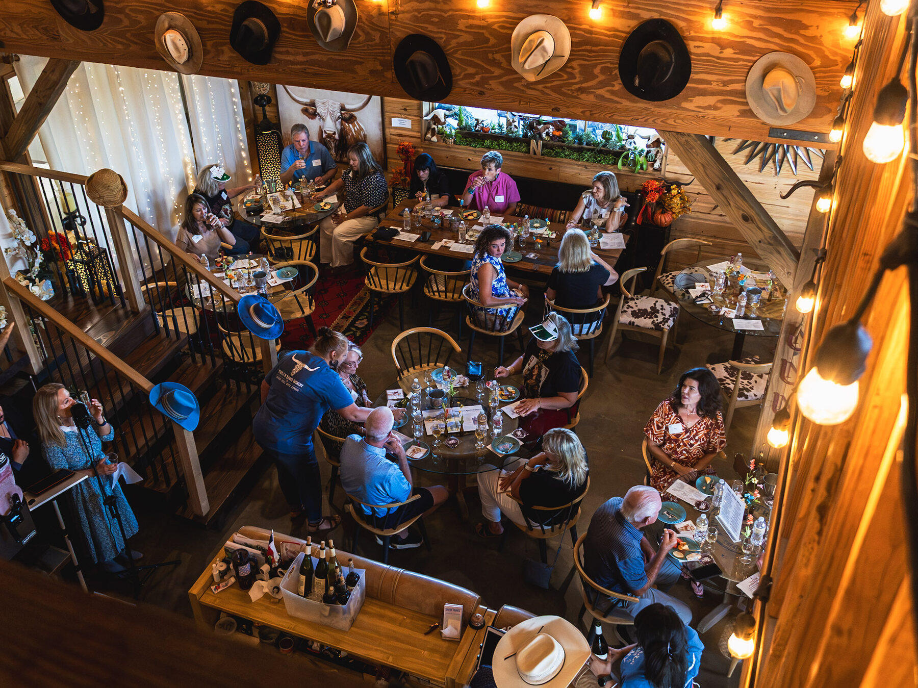 Guests enjoying a lively winery gathering