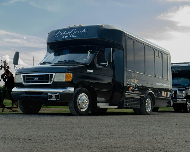 Cedar Creek Social bus parked outside during a wine event